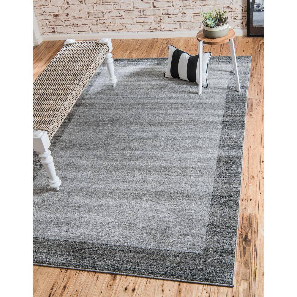 Light Gray 9' x 12' Easy Care Tufted Synthetic Rug