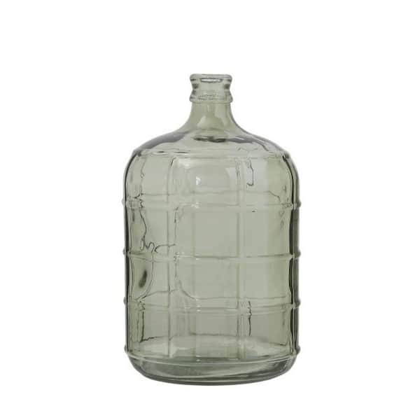 https://images.thdstatic.com/productImages/8b6e1070-0658-421a-81b7-adbbe137875f/svn/transparent-green-storied-home-decorative-bottles-df0438-31_600.jpg