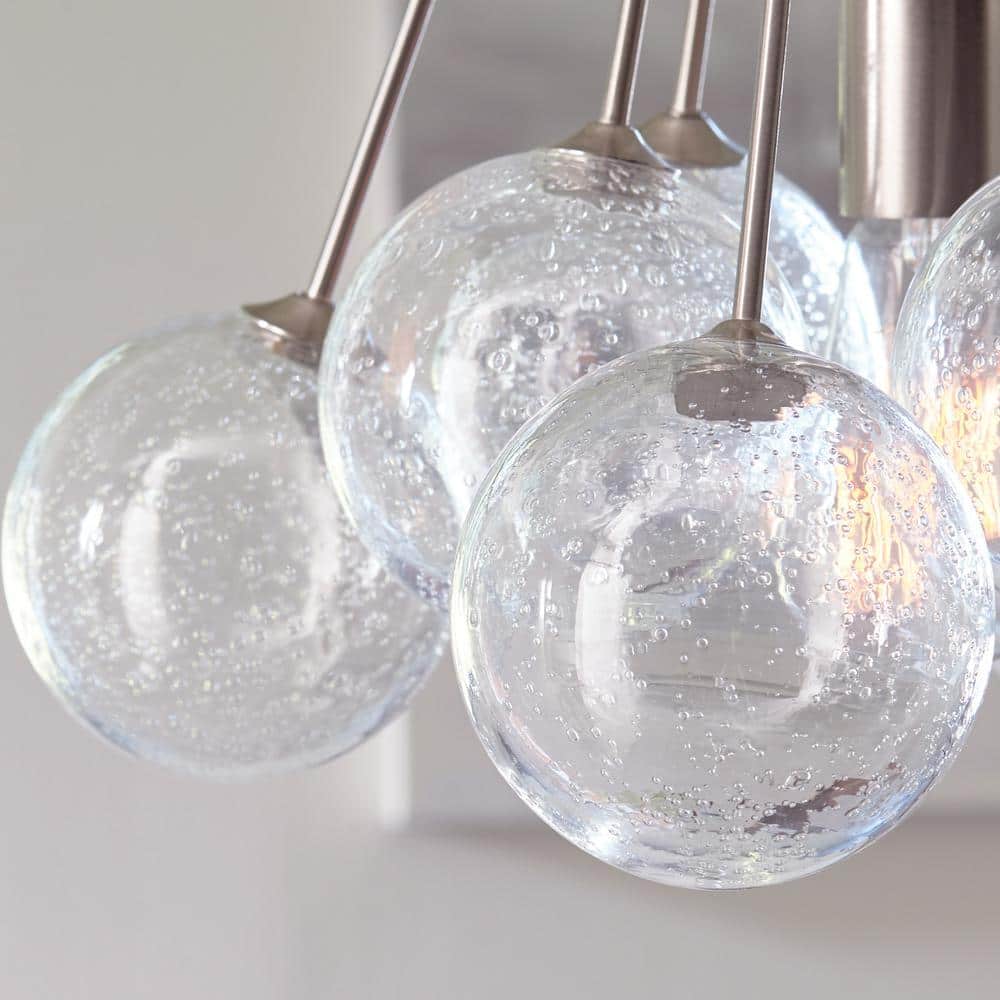 Elegant Mid-Century Satin Brass Globe Pendant with Seeded Glass