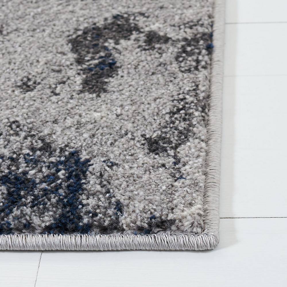Navy and Grey Abstract 8' x 10' Synthetic Area Rug