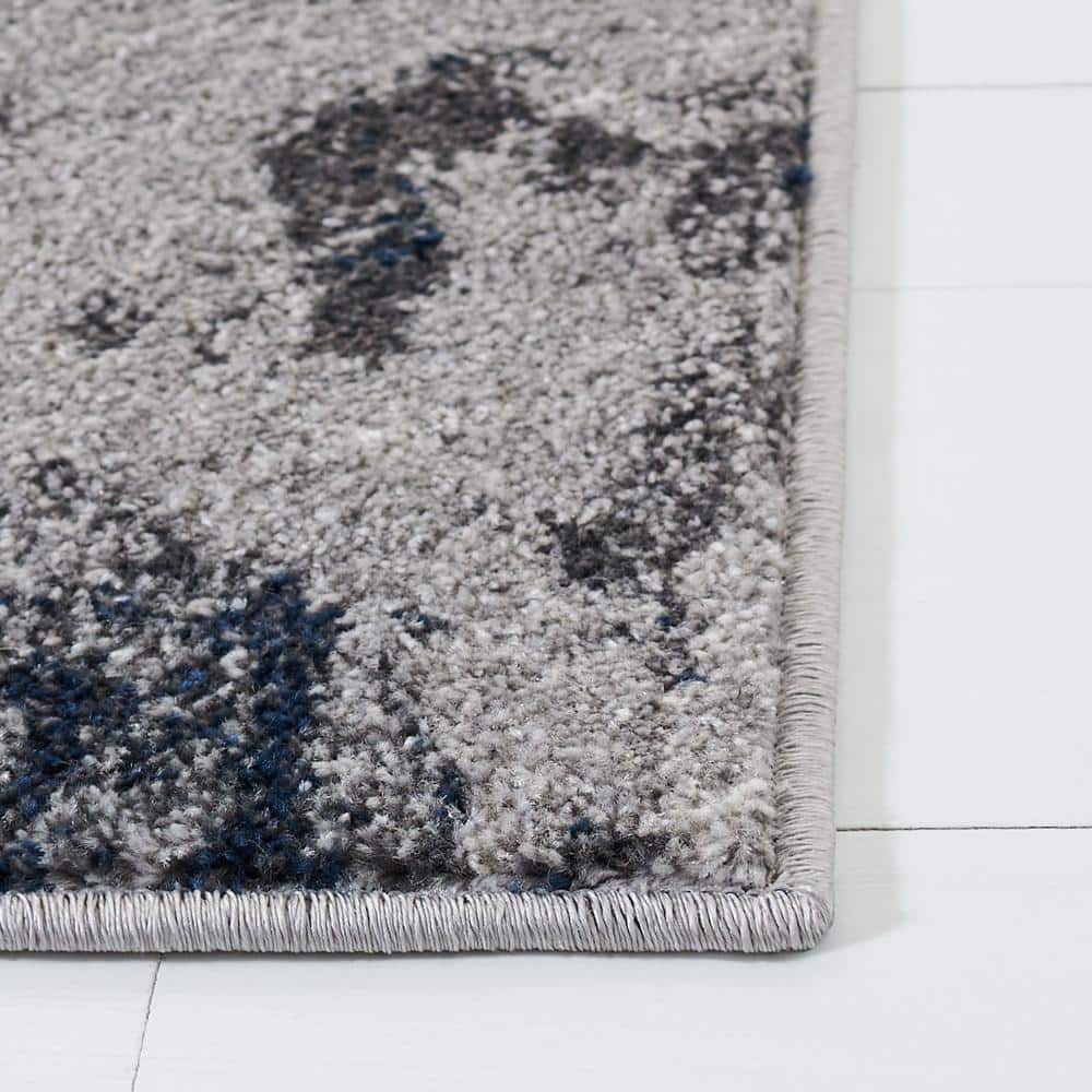 Navy and Grey Abstract 9' x 12' Synthetic Area Rug