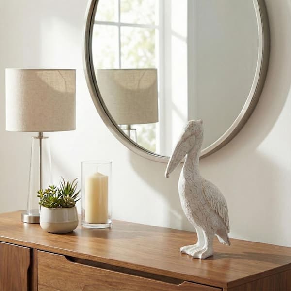 Liv & Skye White 9 in. x 14 in. Ceramic Standing Pelican Figurine 