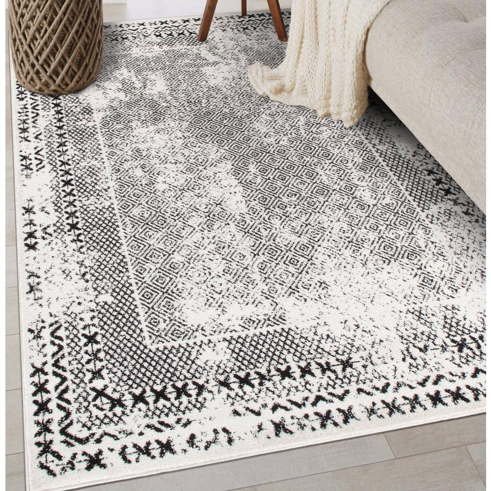 Black Geometric 5' x 7' Synthetic Easy Care Area Rug