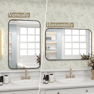 26 in. W x 38 in. H Rectangular Aluminum Alloy Framed Rounded Black Wall Mirror