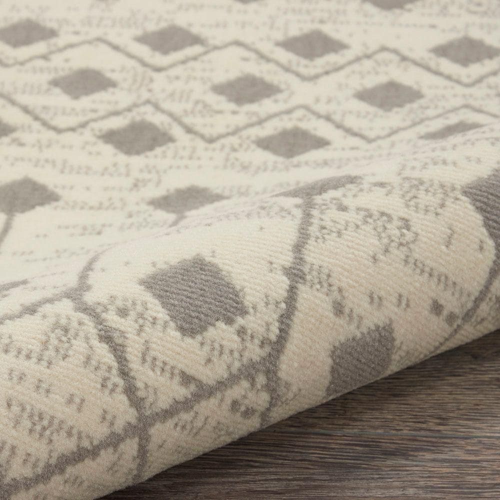 Ivory and Grey Geometric Round Synthetic Area Rug, 63"