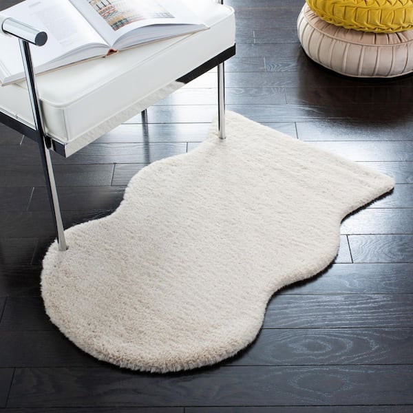 Faux Sheep Skin 2 ft. x 3 ft. Beige Flokati Solid Color Specialty Area Rug