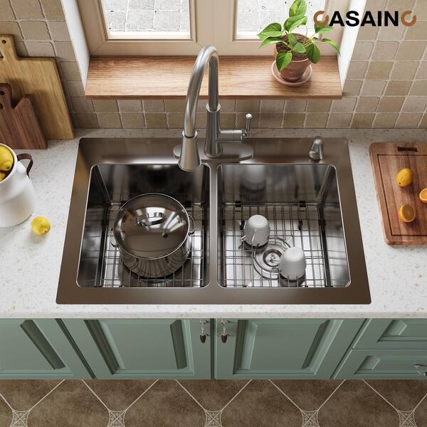 https://images.thdstatic.com/productImages/8b9a7ba8-57c2-4078-90fa-369755863df1/svn/brushed-stainless-steel-casainc-drop-in-kitchen-sinks-kcsc0004-t3322d-40_600.jpg