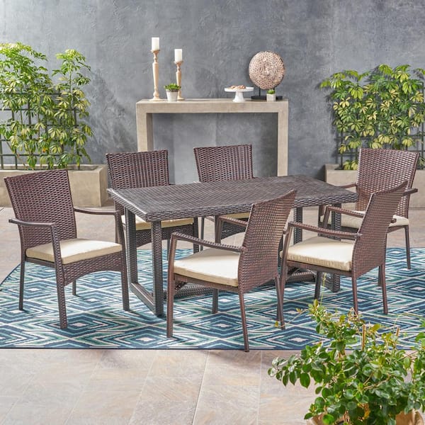 Noble House Knox Multi-Brown 7-Piece Faux Rattan Outdoor Dining Set with Crme Cushion
