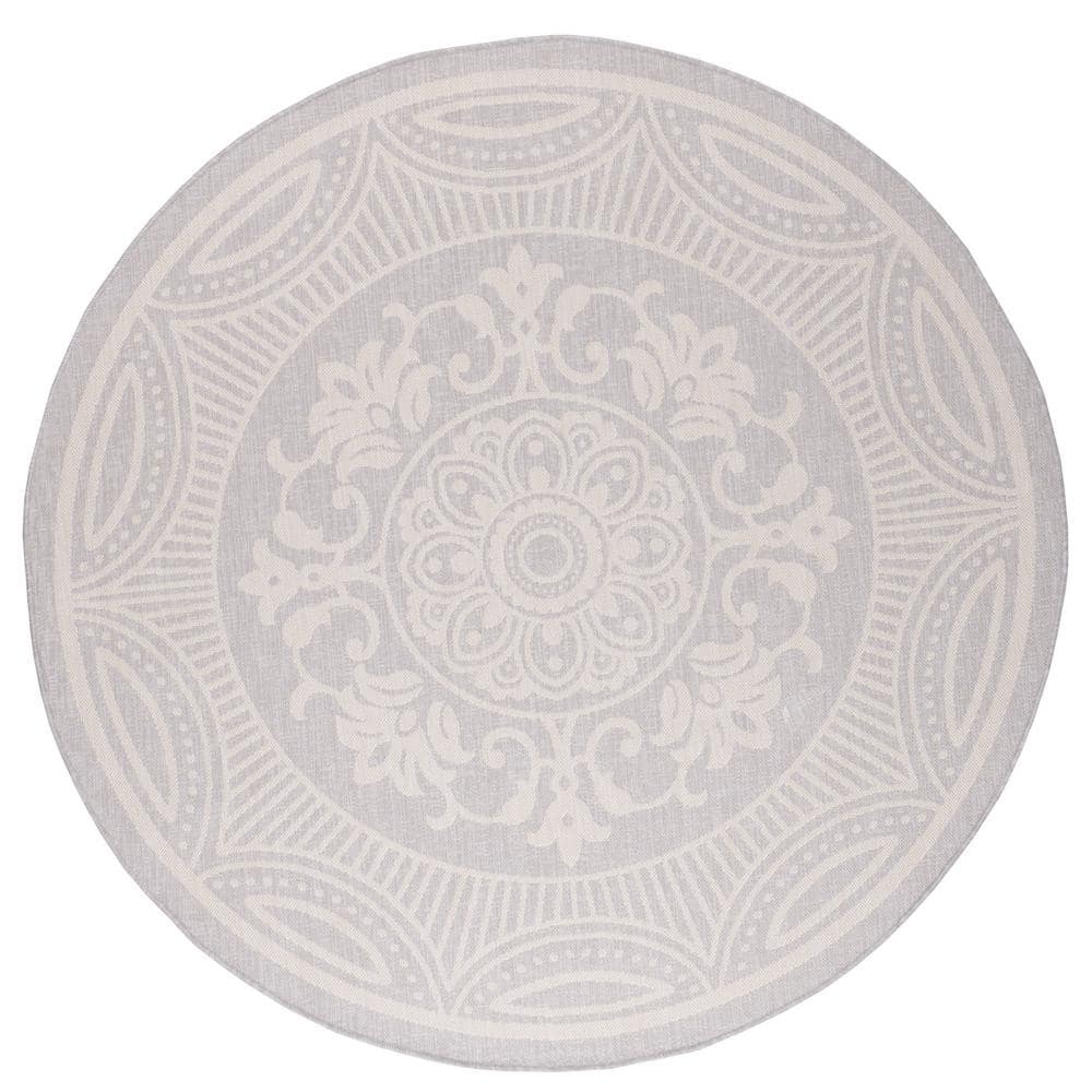 Beverly Rug Waikiki Grey/White 7 ft. Round Medallion Indoor/Outdoor Area Rug, Gray/White Beverly Rug indoor outdoor rugs are available in various sizes; 4 ft. x 6 ft. area rug (3 ft. 11 in. x 5 ft. 11 in.) area rug 5 ft. x 7 ft. (5 ft. 3 in. x 7 ft.), 6 ft. x 9 ft. area rugs (6 ft. 7 in. x 9 ft.), large area rug 8 ft. x 10 ft. (7 ft. 10 in. x 10 ft.) and 6 ft. 7 in. circle rug. You can use our non shedding rugs wherever needed; either indoors such as living room, dining room, laundry room, bedroom, hallway, children playroom, or outdoors such as deck, patio, pool side, picnic, beach, garage, or guest lounges. These fade resistant indoor rugs has UV protection and offer environment protection with their eco-friendly and breathable material. The vibrant colors will not fade in the sun. Ideal for high traffic areas. With natural color options of beige, blue, grey and dark grey, this beautiful medallion area rug is perfect fit for your vintage decor. Color: Gray/White.