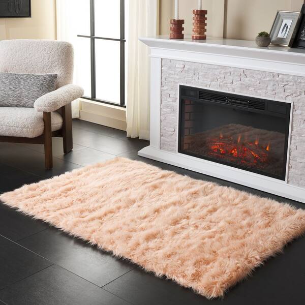 Faux Sheep Skin 4 ft. x 6 ft. Light Pink Solid Area Rug