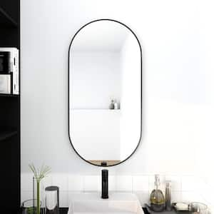 17.7 in. W x 35.4 in. H Oval Aluminum Framed Wall-Mounted Bathroom Vanity Mirror in Black