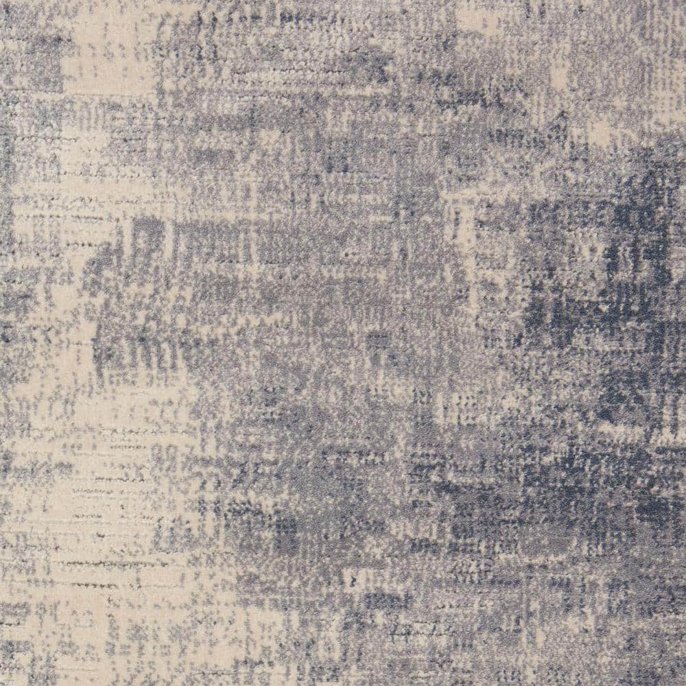 Round Blue and Ivory Abstract Area Rug 7'10"