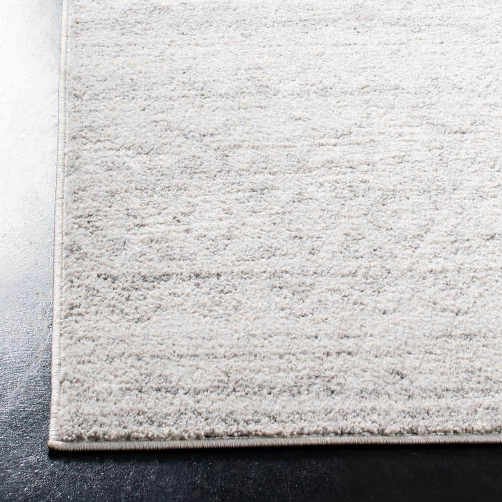 Ivory and Silver Rectangular Reversible Area Rug 6' x 9'