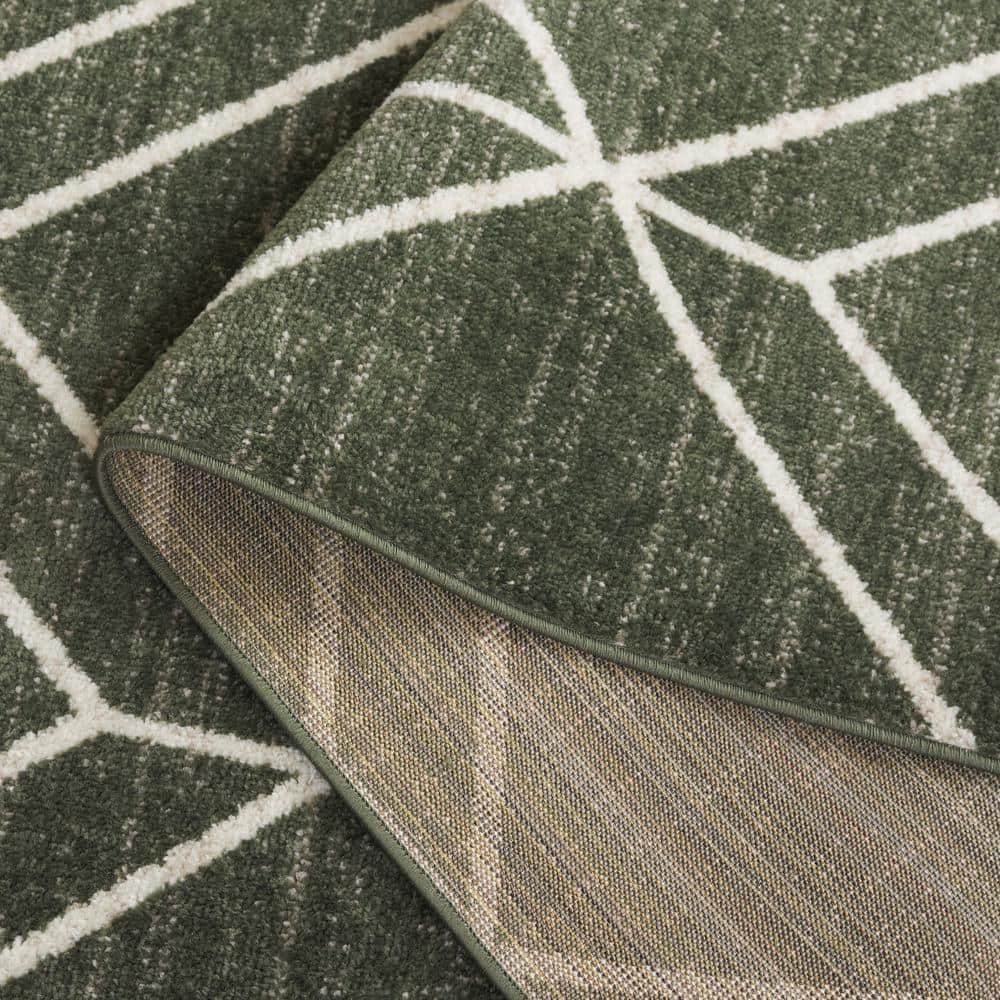 Ivory and Dark Green Geometric Synthetic Area Rug 5'1" x 7'6"
