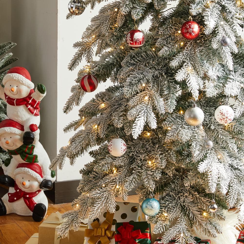 9ft Narrow Flocked Spruce Christmas Tree with Warm White Lights