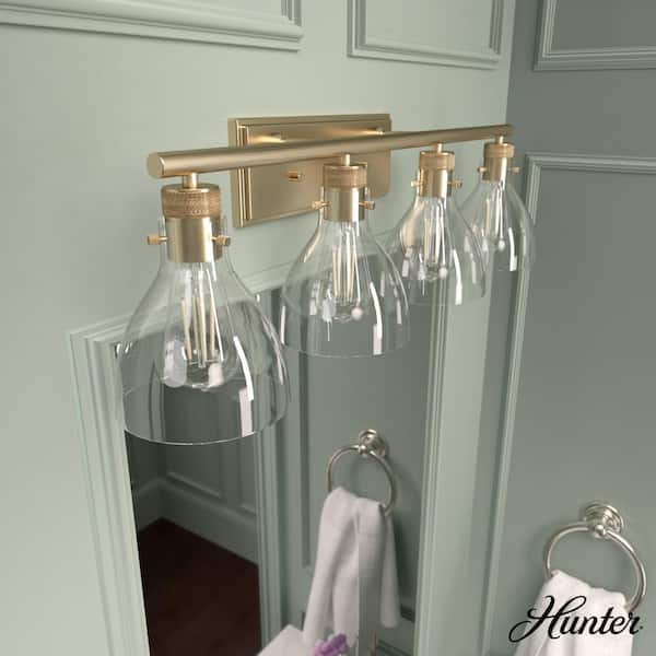 Hunter Van Nuys 32 in. 4-Light Alturas Gold Vanity-Light with Clear Glass Shades Bathroom Light