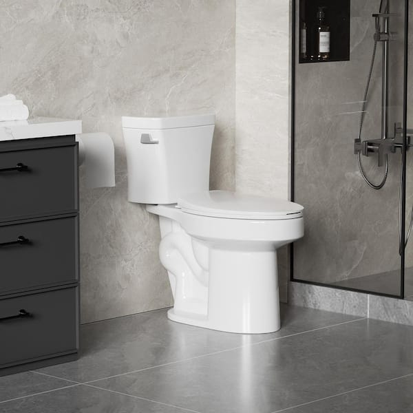 29 in. 2-Piece 1.28 GPF Side Single Flush Elongated Toilet in Glossy White Seat Included