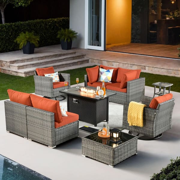 XIZZI Echo 9-Piece Wicker Patio Rectangular Fire Pit Set with Orange Red Cushions and Swivel Rocking Chairs