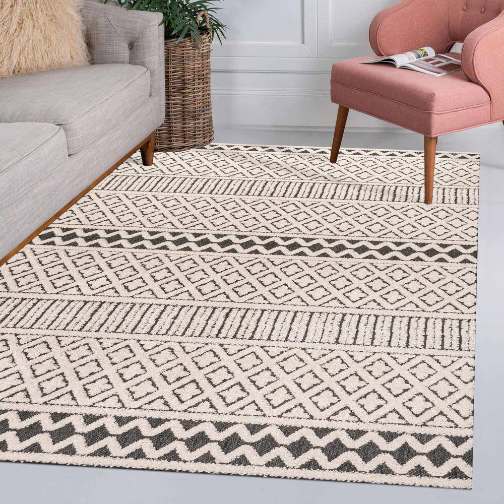 Cream and Black Geometric Synthetic Indoor/Outdoor Area Rug