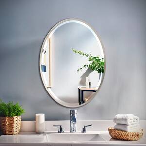 Flush 20.5 in. W x 27.5 in. H Framed Oval Beveled Edge Bathroom Vanity Mirror in Satin Nickel