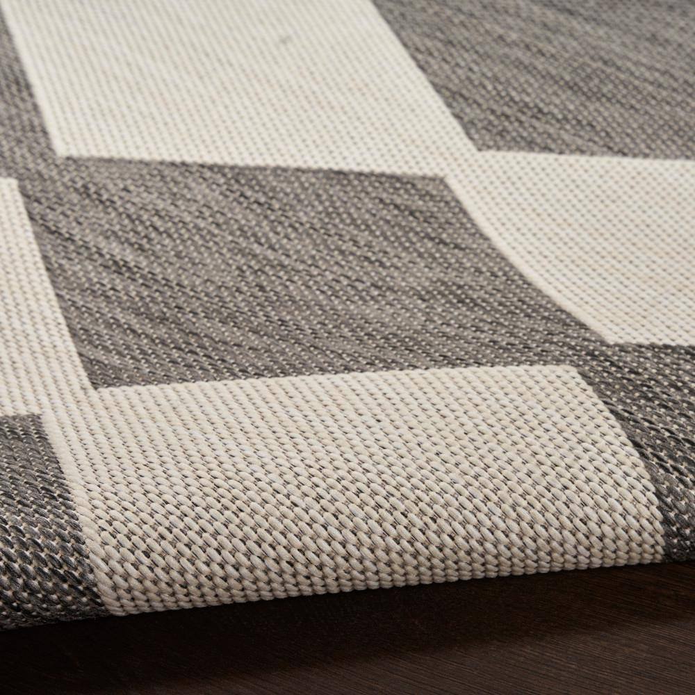 Charcoal and Off-White Diamond Pattern Synthetic 5' x 7' Rug