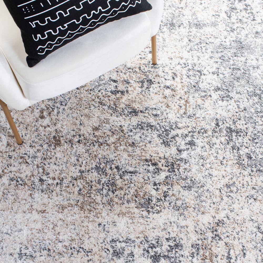 Aston Ivory and Gray Abstract Synthetic Area Rug 3' x 5'