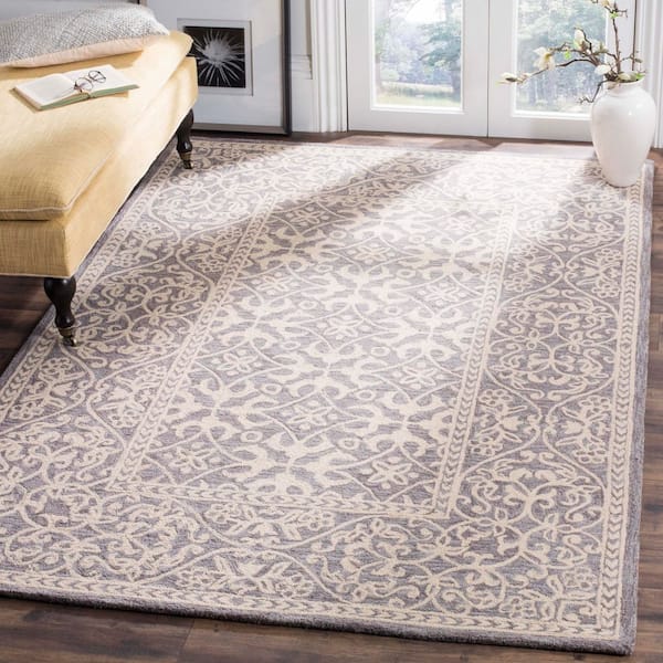Suzani 5 ft. x 8 ft. Gray/Beige Oriental Border Area Rug