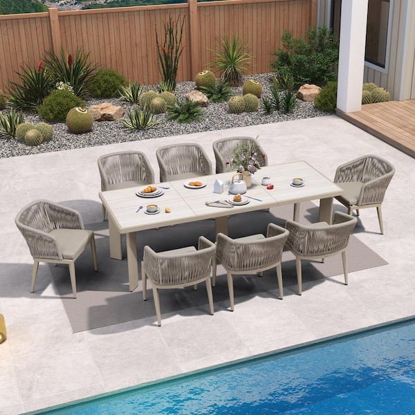 9-Piece Aluminum Wicker Dining Table and Armchairs Patio Outdoor Dining Set Champagne Furniture Set with Cushions