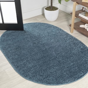 Haze Solid Low-Pile Turquoise 3 ft. x 5 ft. Oval Area Rug