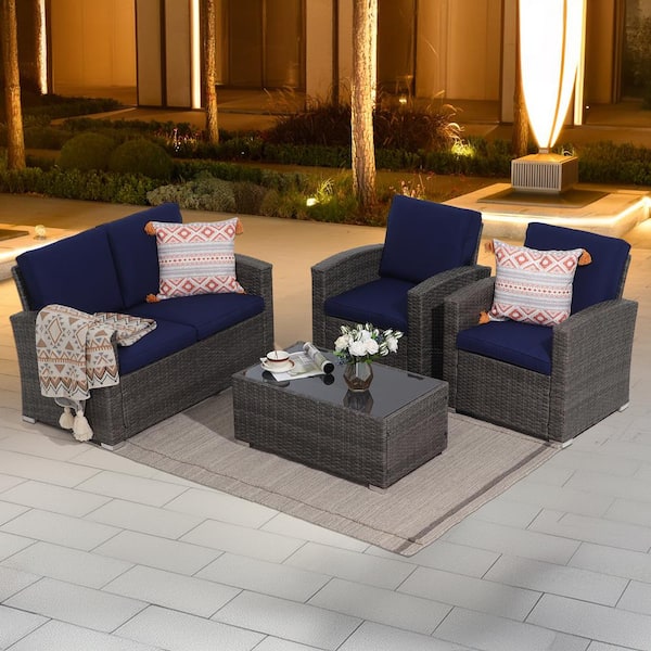 Freestyle 4-Piece Grey Wicker Outdoor Conversation Set with Coffee Table, Navy Blue Cushions