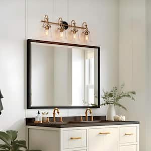 Transitional 30 in. 4-Light Black and Brass Vanity Light with Bell Seeded Glass Shades