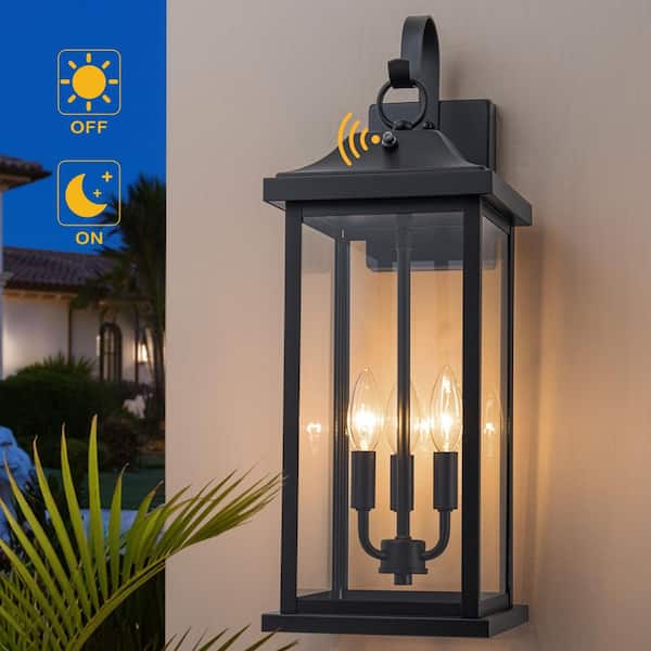 22. 25in. Black Dusk to Dawn Outdoor Hardwired Wall Lantern Sconce with Clear Glass, No Bulbs Included (1-Pack)