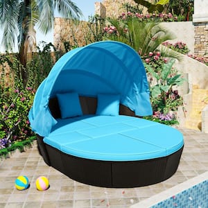 Black Wicker Outdoor Sectional Day Bed with Blue Cushions and Canopy
