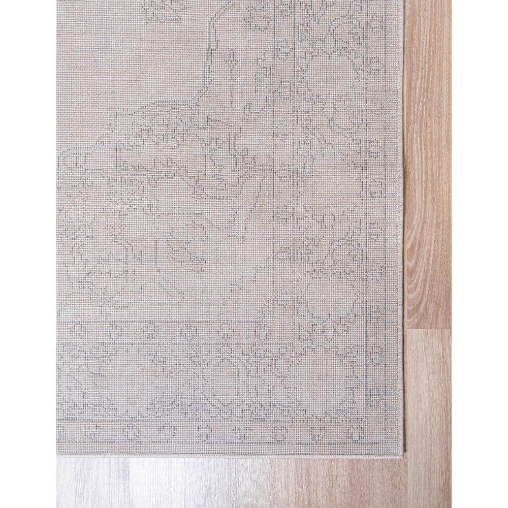 Ivory and Gray Geometric Synthetic 6' x 9' Area Rug