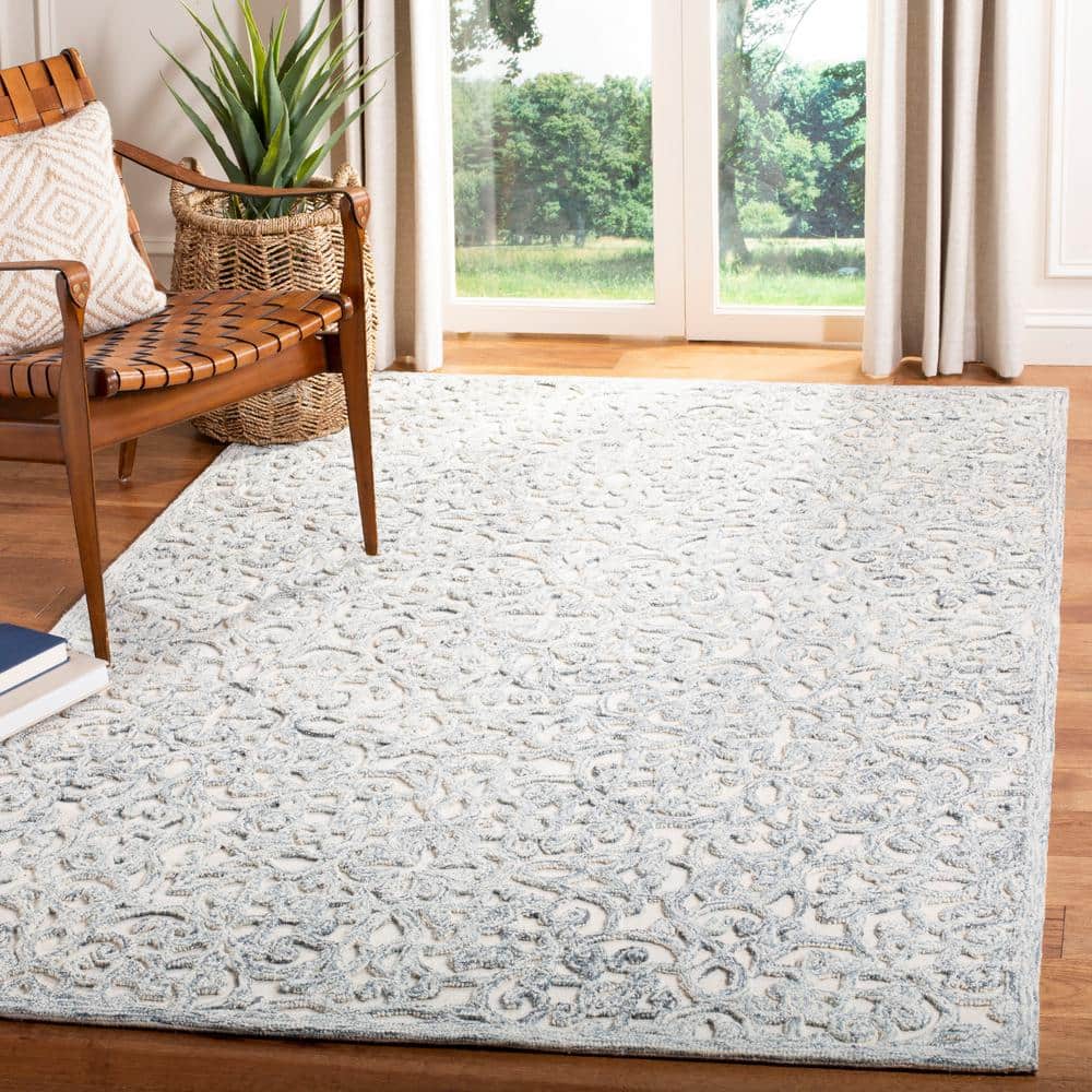 Ivory Hand-Tufted Wool 6' x 9' Area Rug