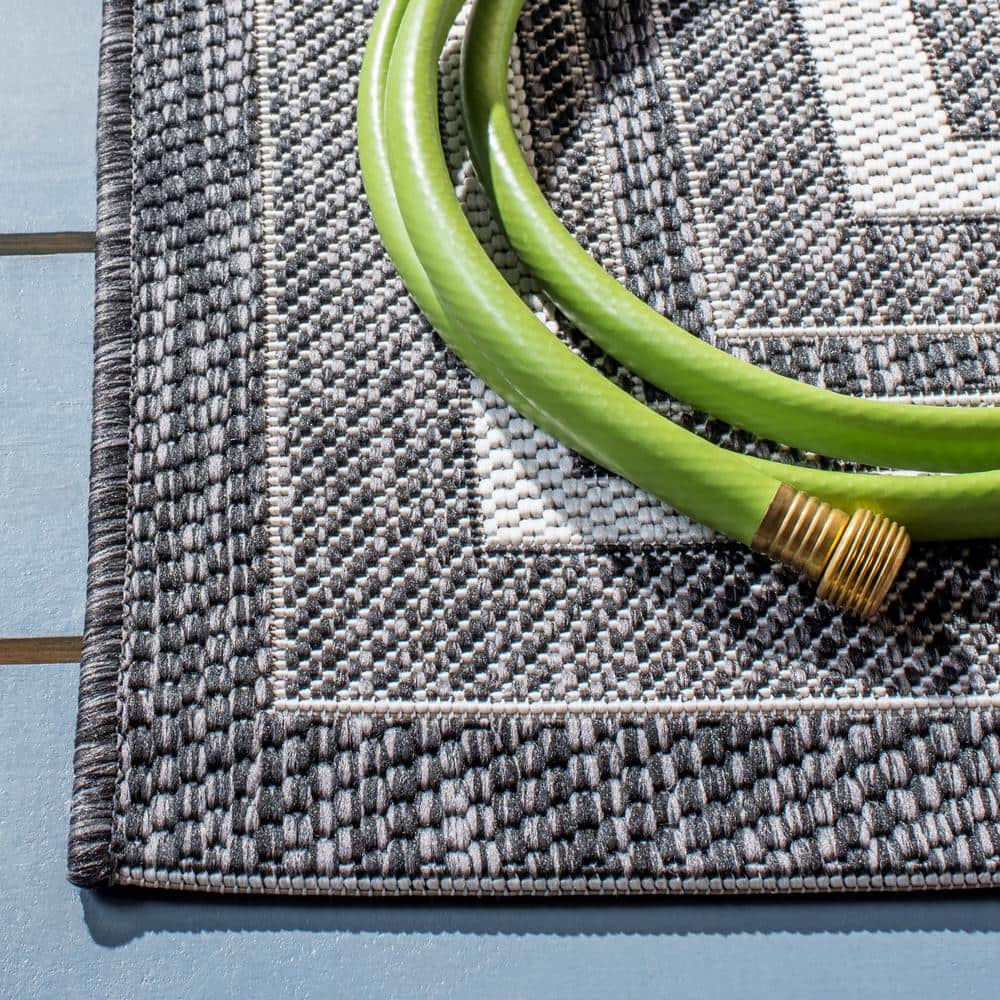 Ivory and Black Reversible Square Synthetic Indoor/Outdoor Rug
