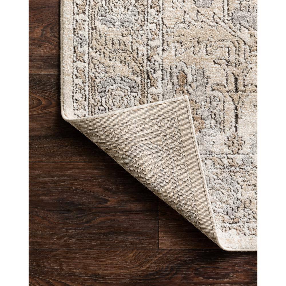 Ivory and Sand Rectangular Synthetic Area Rug 6'-7" x 9'-2"