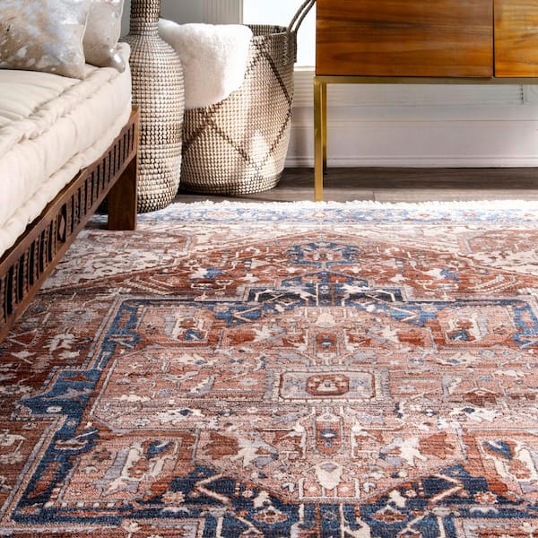 https://images.thdstatic.com/productImages/8ce123c9-6423-4789-9bcd-5176be049233/svn/blue-nuloom-area-rugs-khmc04e-9012-1f_600.jpg