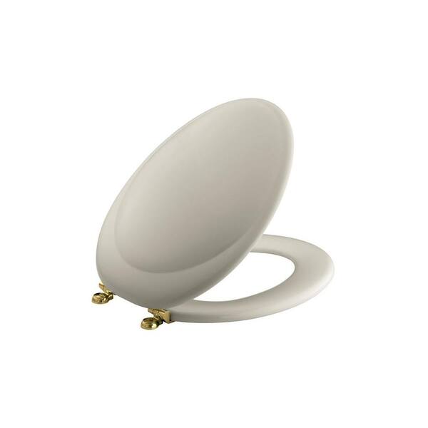 KOHLER Revival Elongated Closed-Front Toilet Seat in Sand Bar with Polished Brass Hinges-DISCONTINUED
