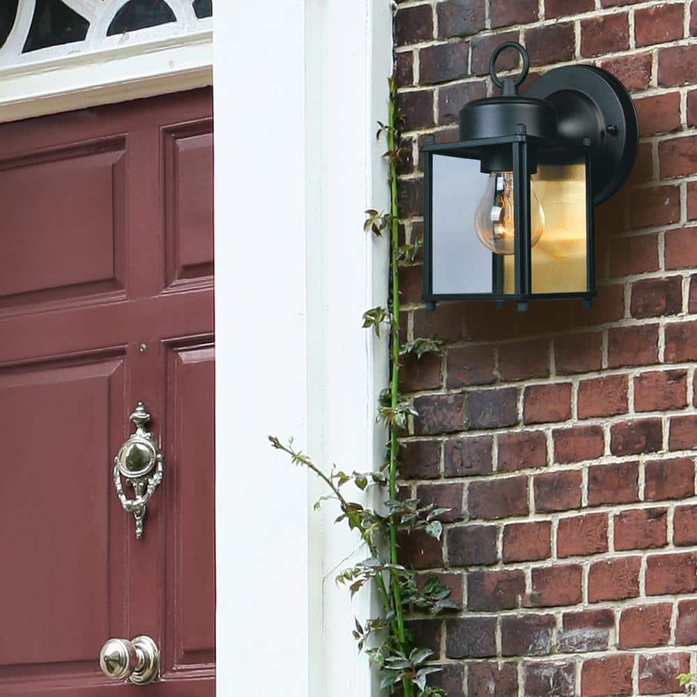 Elegant Black Steel Outdoor Lantern Sconce with Clear Glass