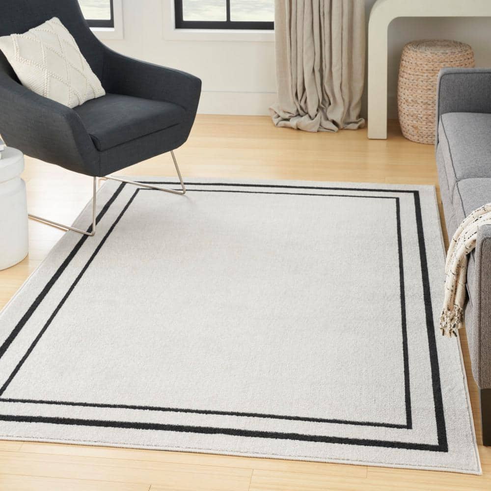 Rectangular Black and Ivory Synthetic 4' x 6' Washable Rug