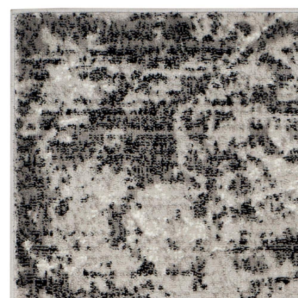 Charcoal and Ivory Abstract Synthetic 5'1" x 7'6" Reversible Area Rug