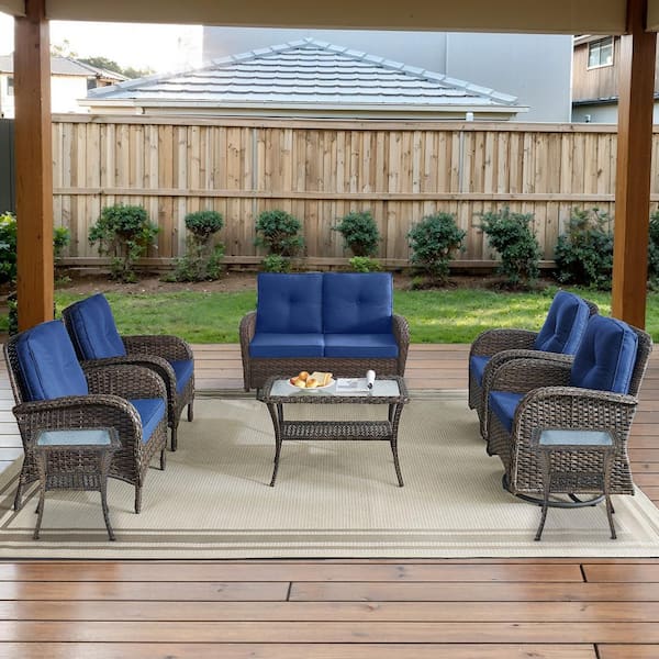 Brown 8-Piece Wicker Patio Conversation Set with Swivel Rockers, Outdoor Glider Seating Set with Navy Blue Cushions