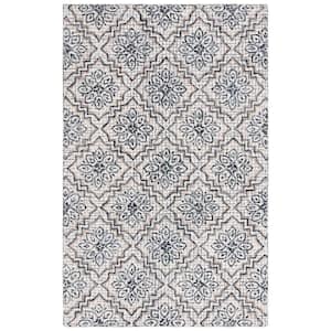 Abstract Ivory/Navy 6 ft. x 9 ft. Diamond Floral Area Rug