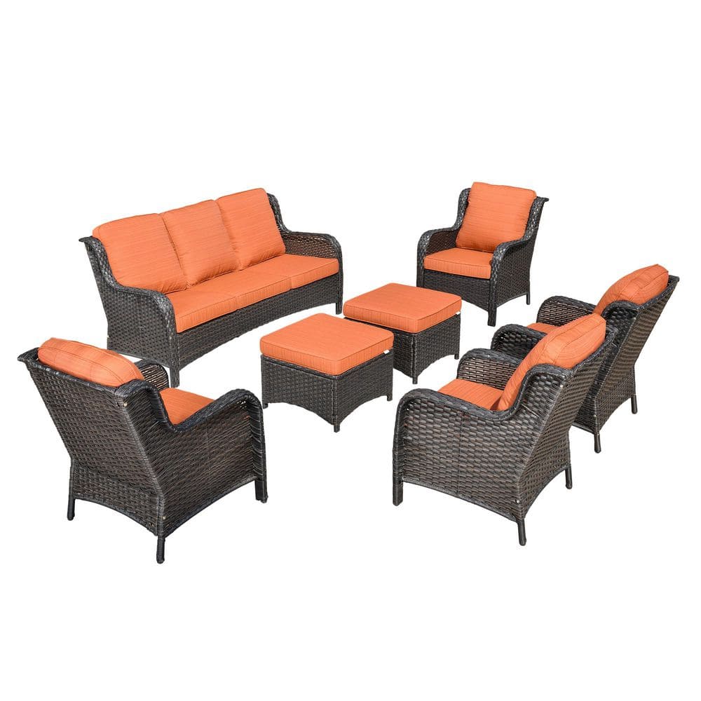 Full 7-piece dark brown wicker patio set with orange-red cushions on a white background.