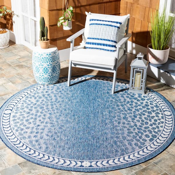 Courtyard Blue/Ivory 7 ft. x 7 ft. Arrow Border Cheetah Indoor/Outdoor Round Area Rug