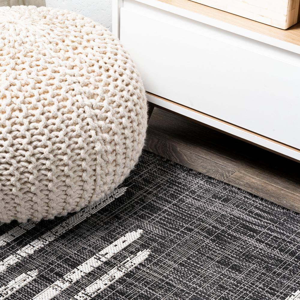 Zolak 4' x 6' Black and Ivory Synthetic Stripe Rug