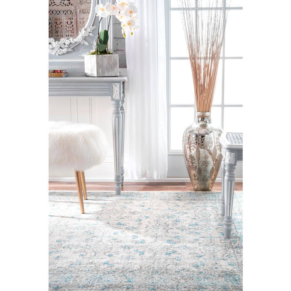 Aqua Blue Floral Synthetic 10' x 14' Area Rug