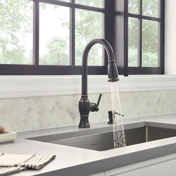 Marchand Single Handle Pull-Down Sprayer Kitchen Faucet in Legacy Bronze Marchand Single Handle Pull-Down Sprayer Kitchen Faucet in Legacy Bronze