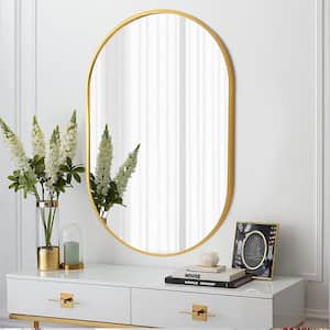20 in. W x 28 in. H Gold Oval Brush Metal Framed Vanity Mirror